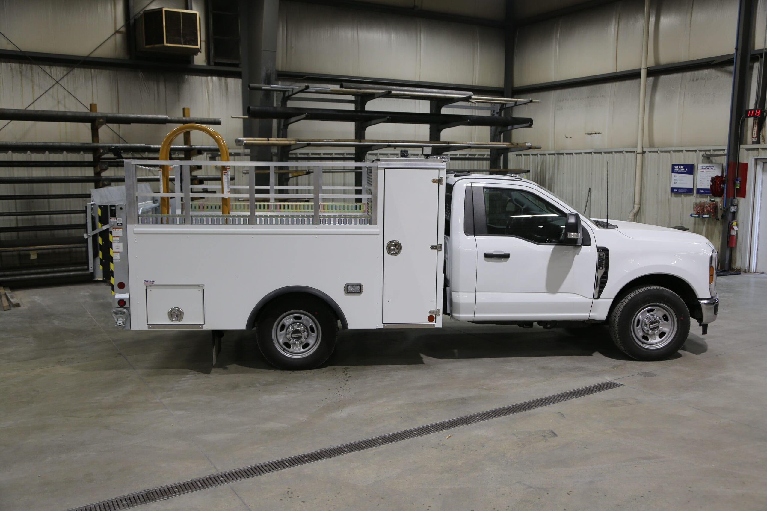 Side view of Stellar Industries' Ford F350 1302-10 Single Rear Wheel Tire Service Truck.